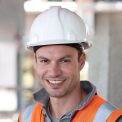Construction worker having coffee break on construction site